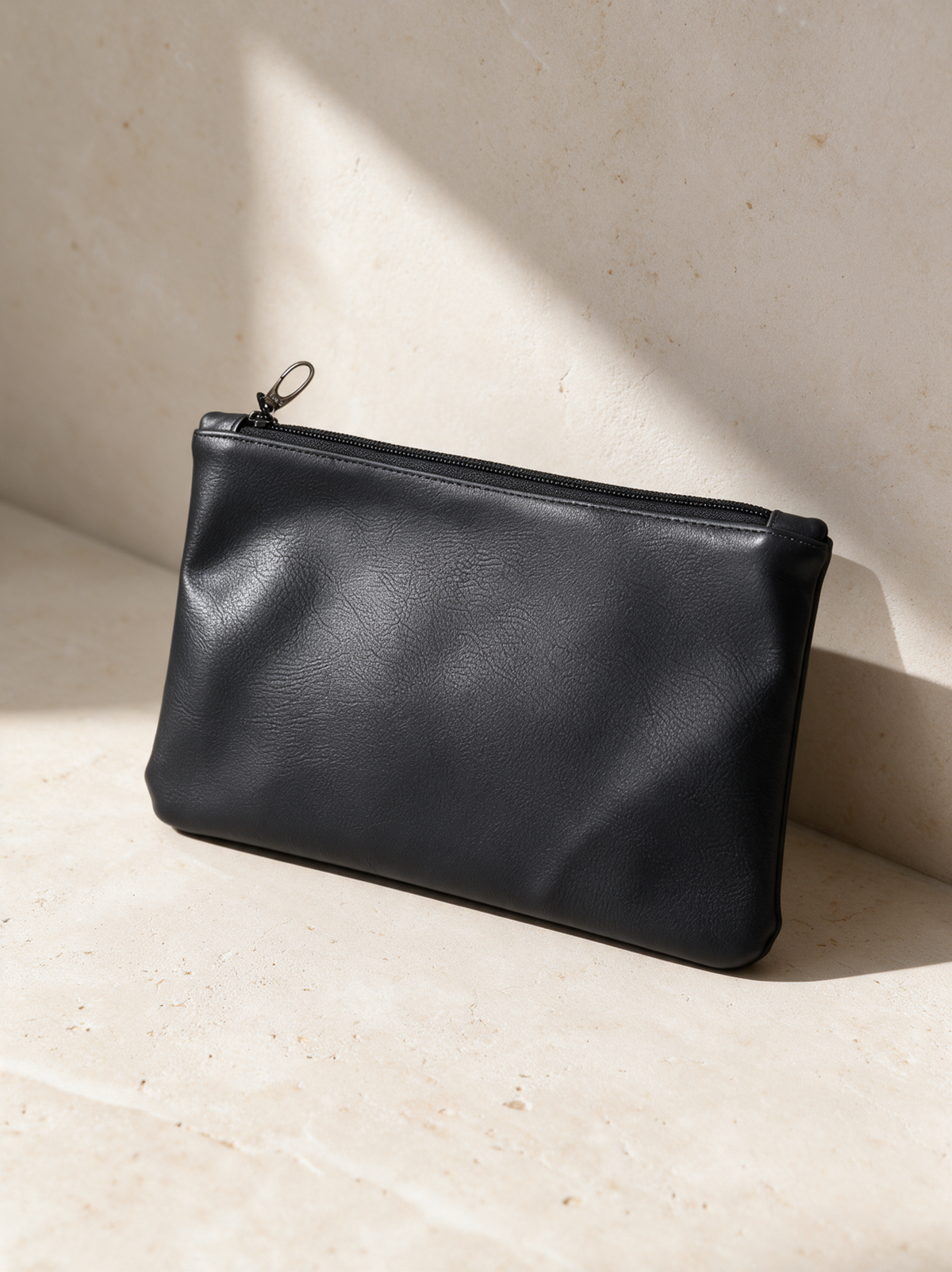 The Accessories Pouch in a warm stone setting