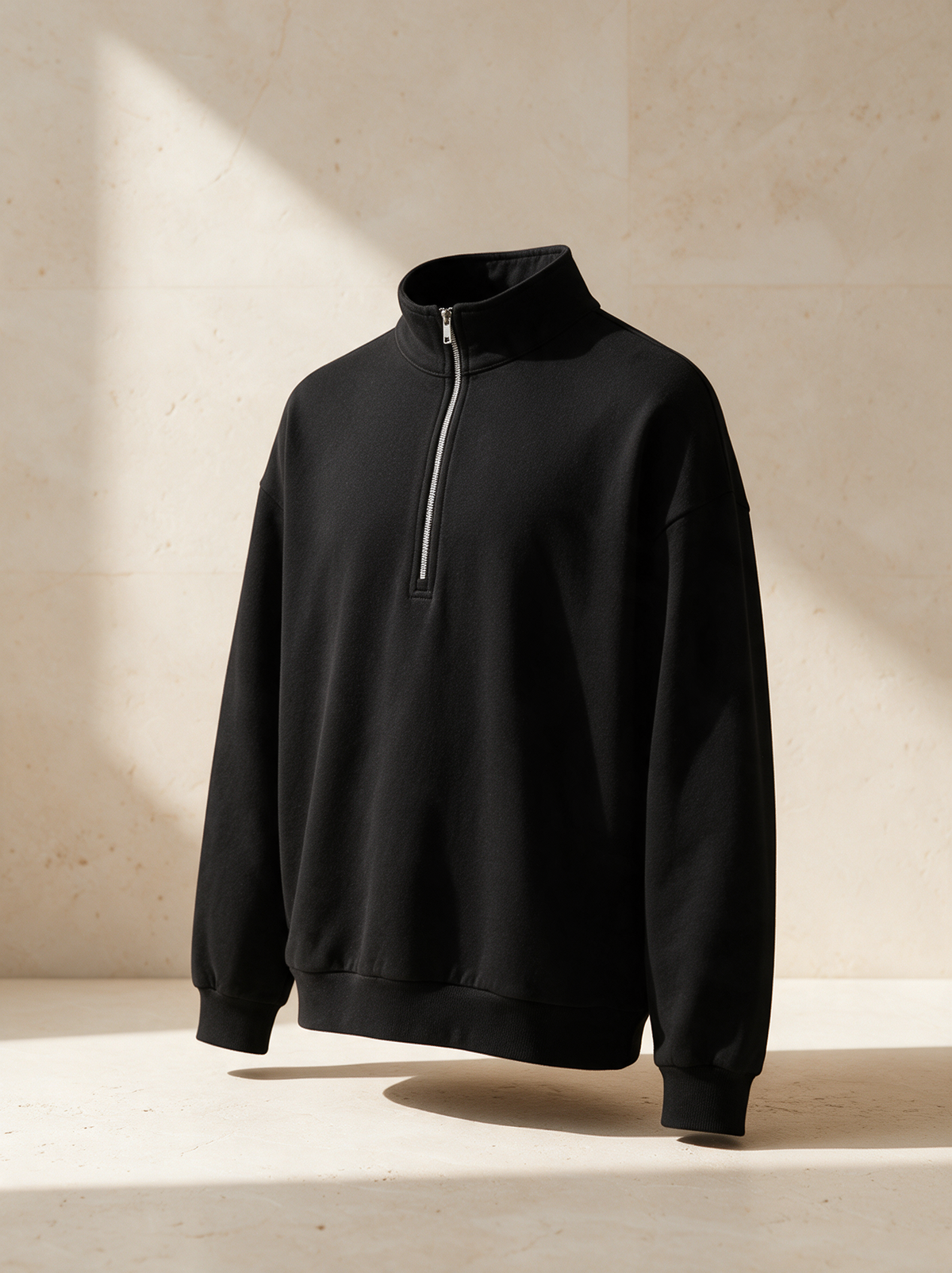 The Quarter Zip in a warm stone setting