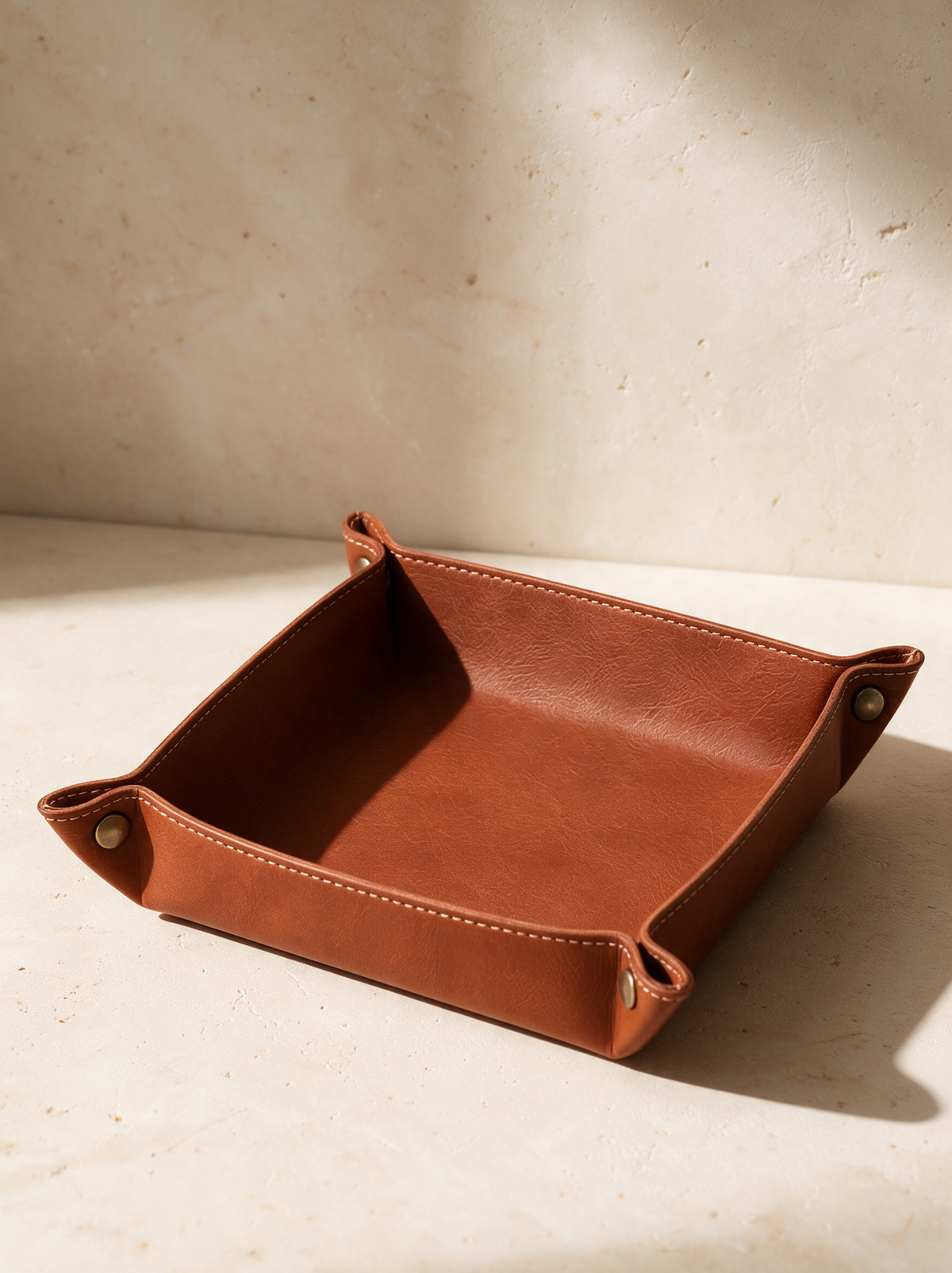 The Valet Tray in a warm stone setting